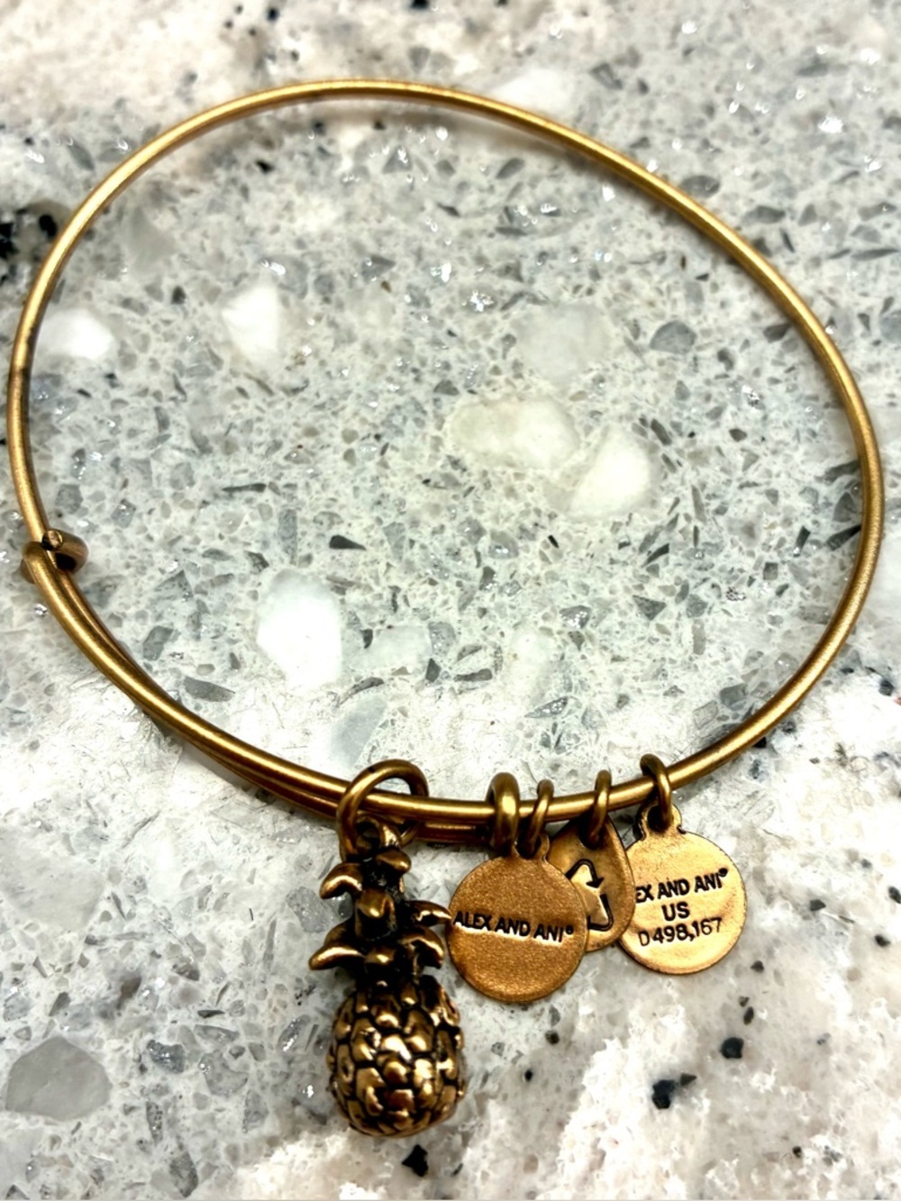 Preowned Alex and Ani gold tone bracelet Pineapple charm
